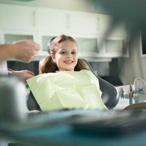 happy-kid-at-pediatric-dentist